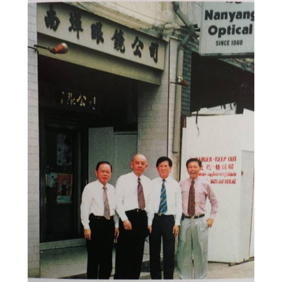 Yang Wah Kiang and partners in optical development